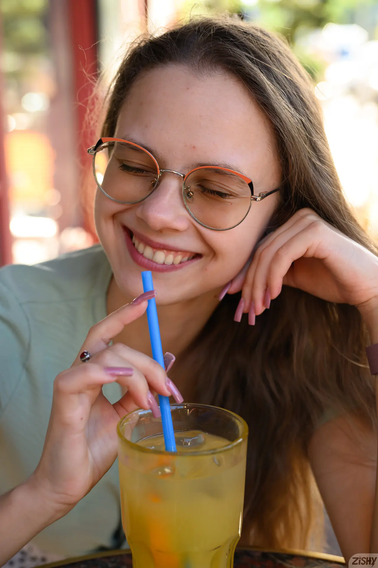 mia-key-zishy-glasses-drink-portrait Mia Key smiling in glasses during her outdoor Zishy photo shoot